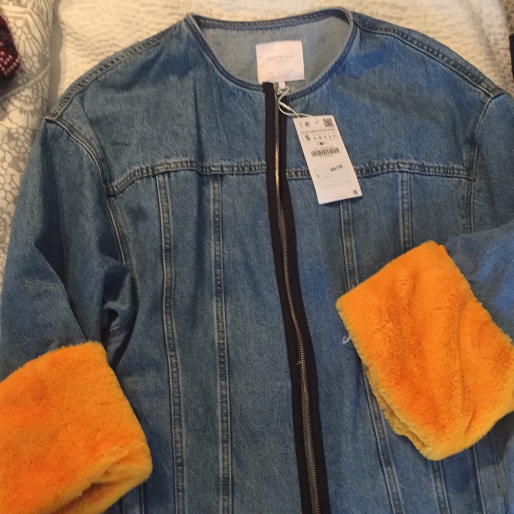 Denim jacket with fur cuffs